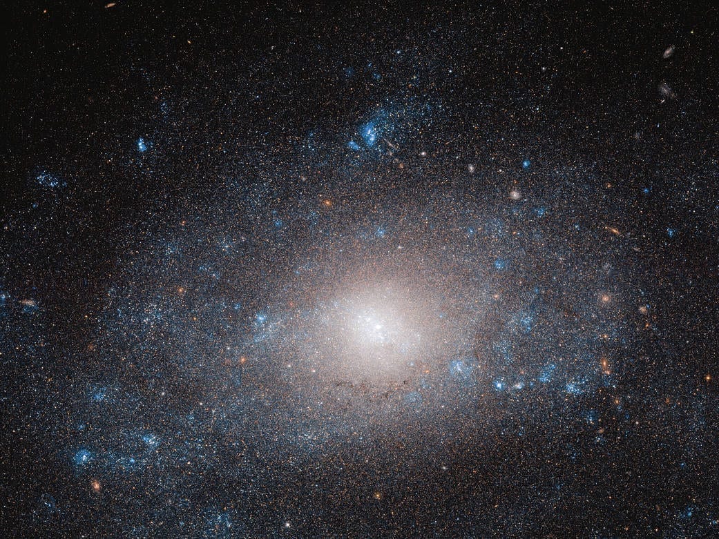 Hubble Views a Galaxy on the ‘Dark Side’